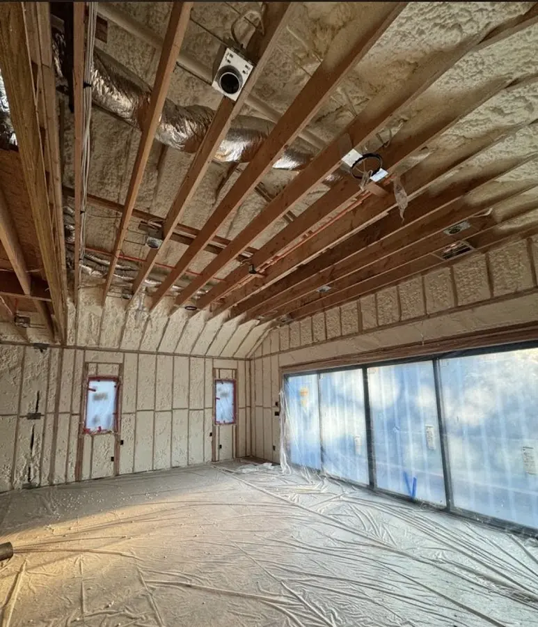 Interior walls and ceiling insulated with spray foam during new construction in Cottage Grove